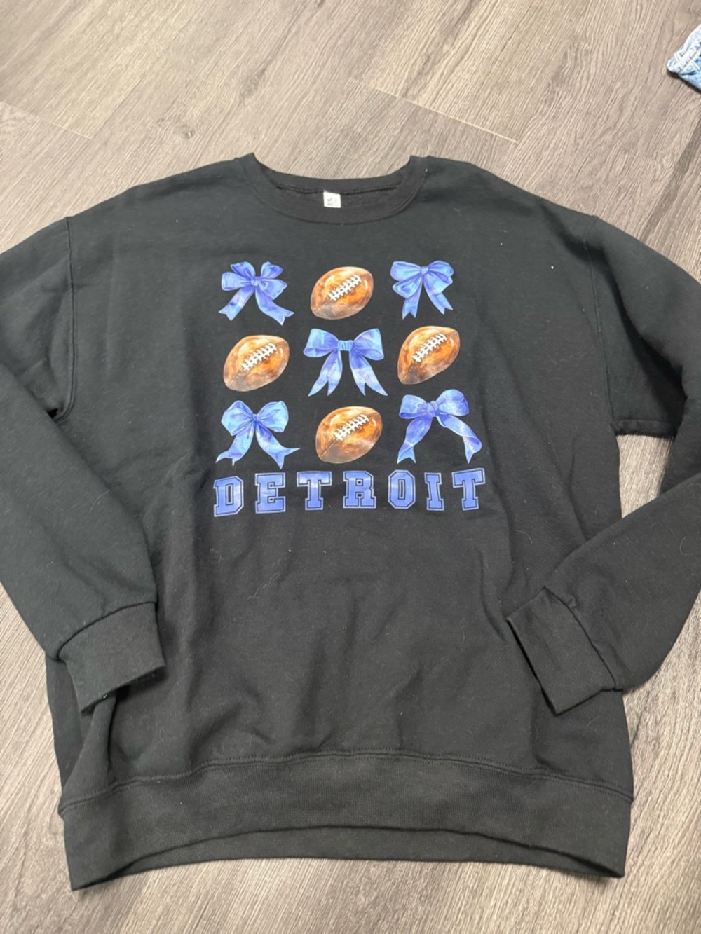 Jerzees Black Detroit Sweatshirt with Blue Bows and Brown Footballs